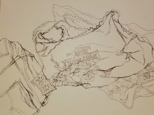 A pen drawing of clothes on the floor